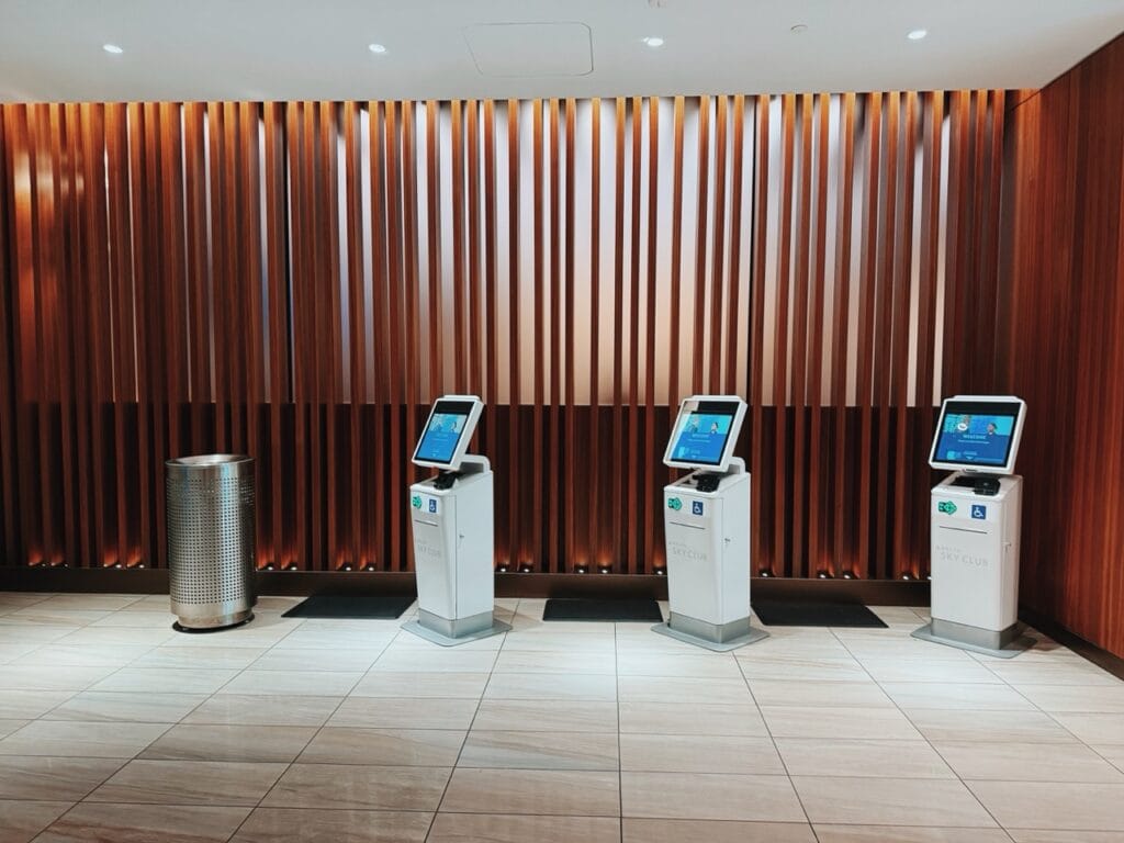 Three Delta Sky Club check-in kiosks
