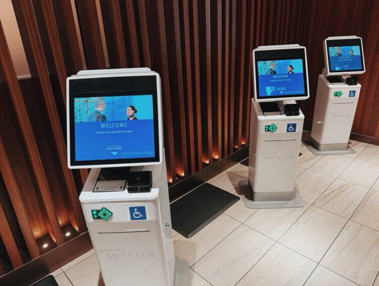 Three Delta Sky Club check-in kiosks