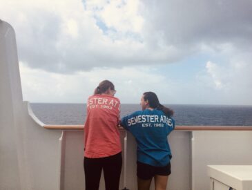 Allie and Sydney look out onto the ocean during Semester at Sea