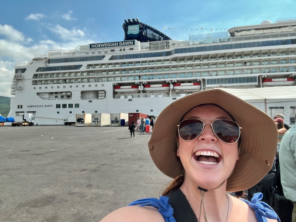Allie Hubers takes a selfie with Norwegian Dawn cruise ship