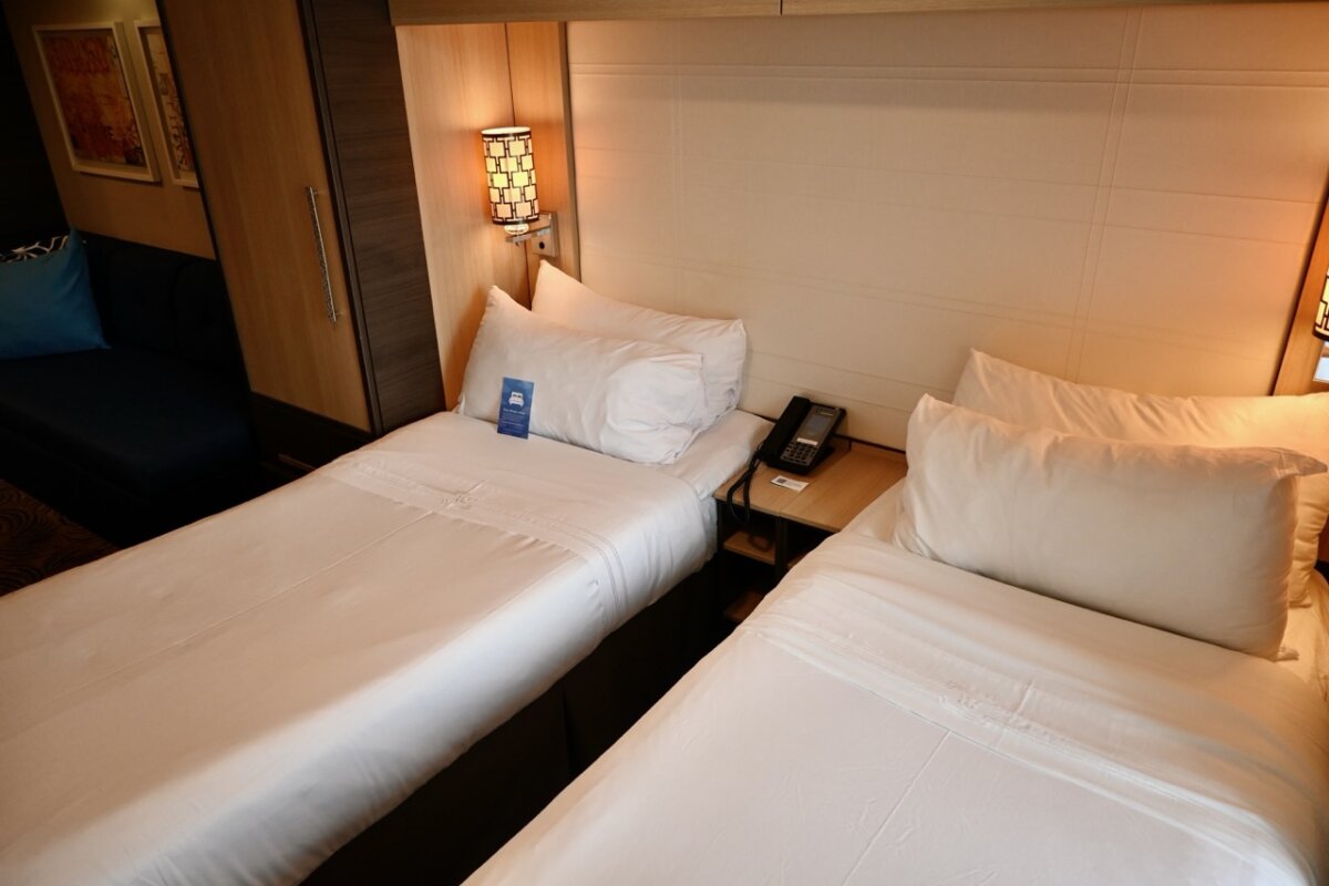 Two beds in balcony cabin on Anthem of the Seas