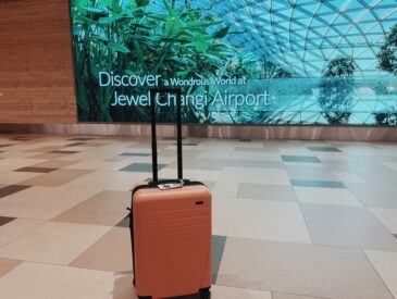 Away Bigger Carry On Flex suitcase in Singapore Airport