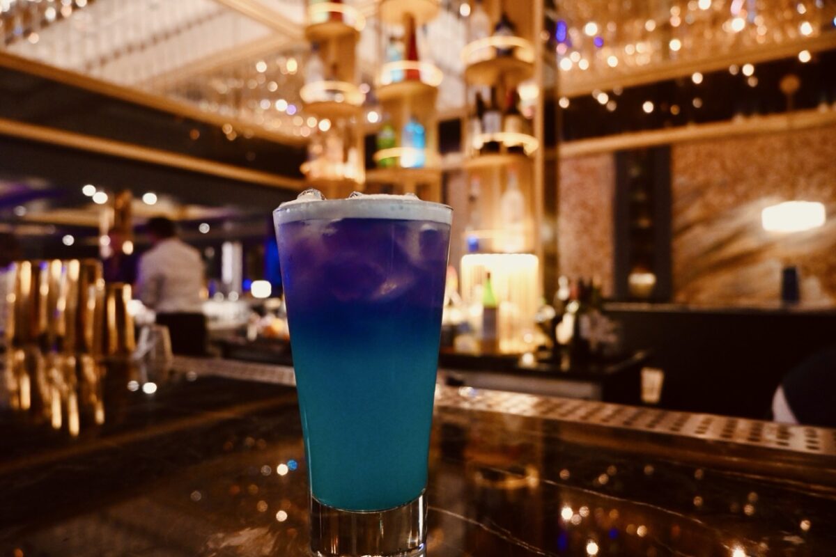 Blue and purple cocktail from the Golden Mermaid bar on a Carnival cruise