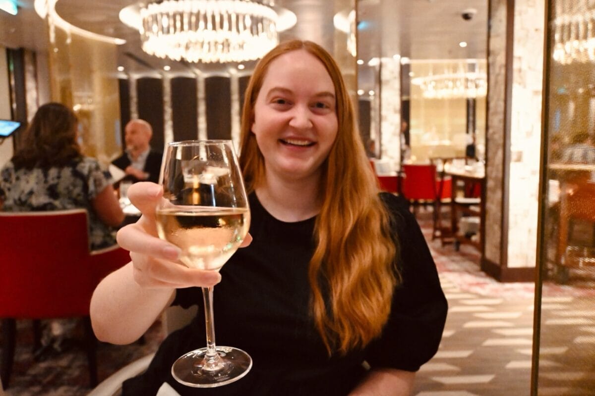 Angie Vognild enjoys a glass of wine at Fahrenheit 555 Steakhouse on a Carnival cruise