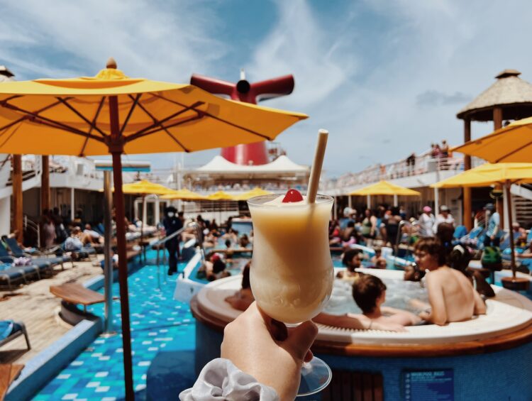 Pina colada on the pool deck of a Carnival cruise