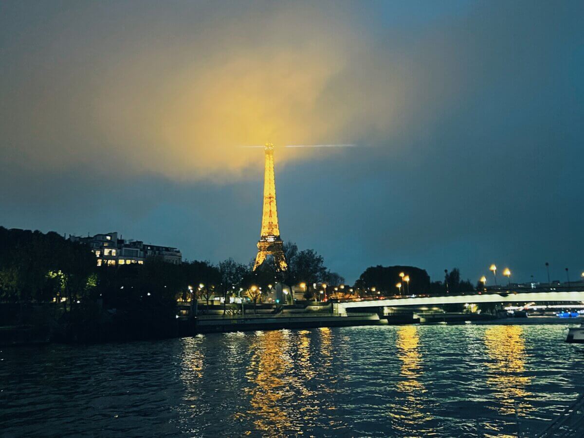 Seine River at night in Paris, France with Eiffel Tower
