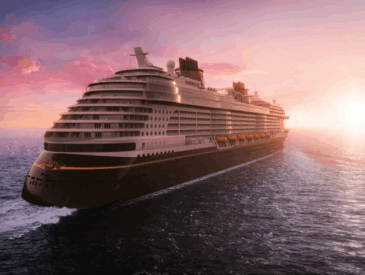 Disney cruise ship at sea during sunset