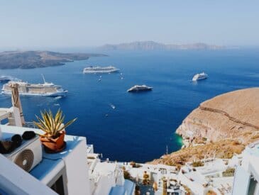 Multiple cruise ships docked in Santorini, Greece
