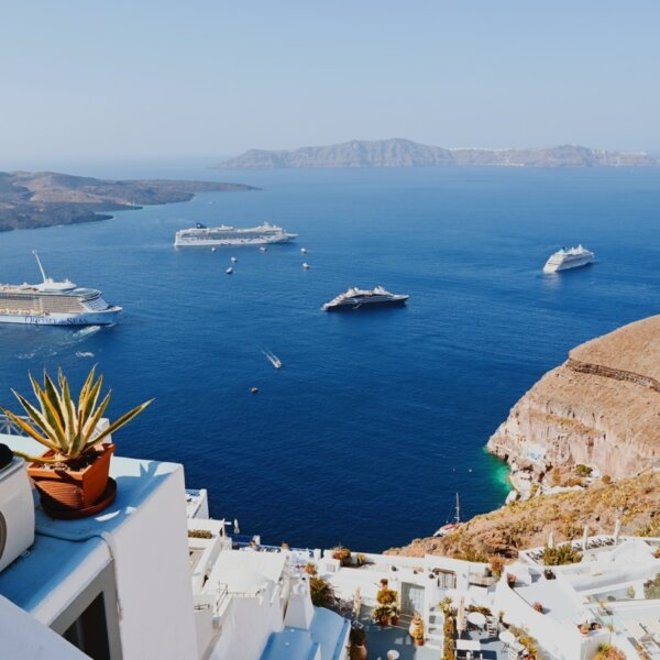 Multiple cruise ships docked in Santorini, Greece