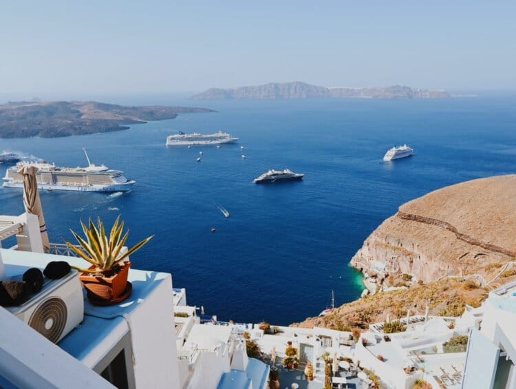 Multiple cruise ships docked in Santorini, Greece