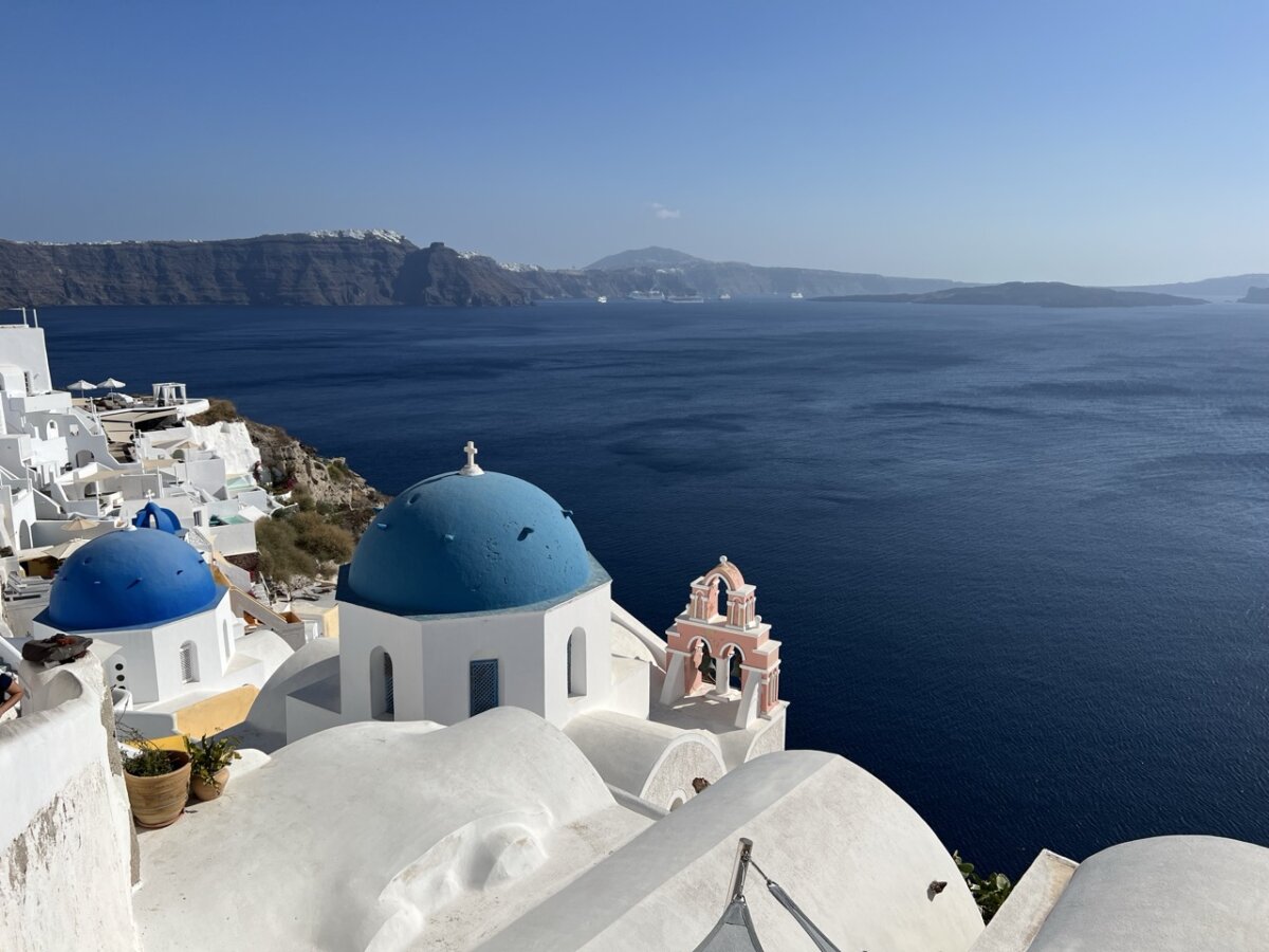 Blue-domed buildings in Oia, Santorini, Greece