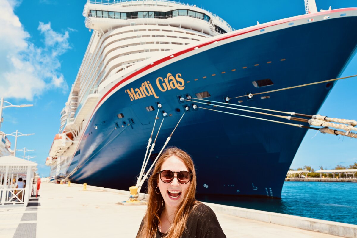 Allie Hubers in front of the Mardi Gras cruise ship