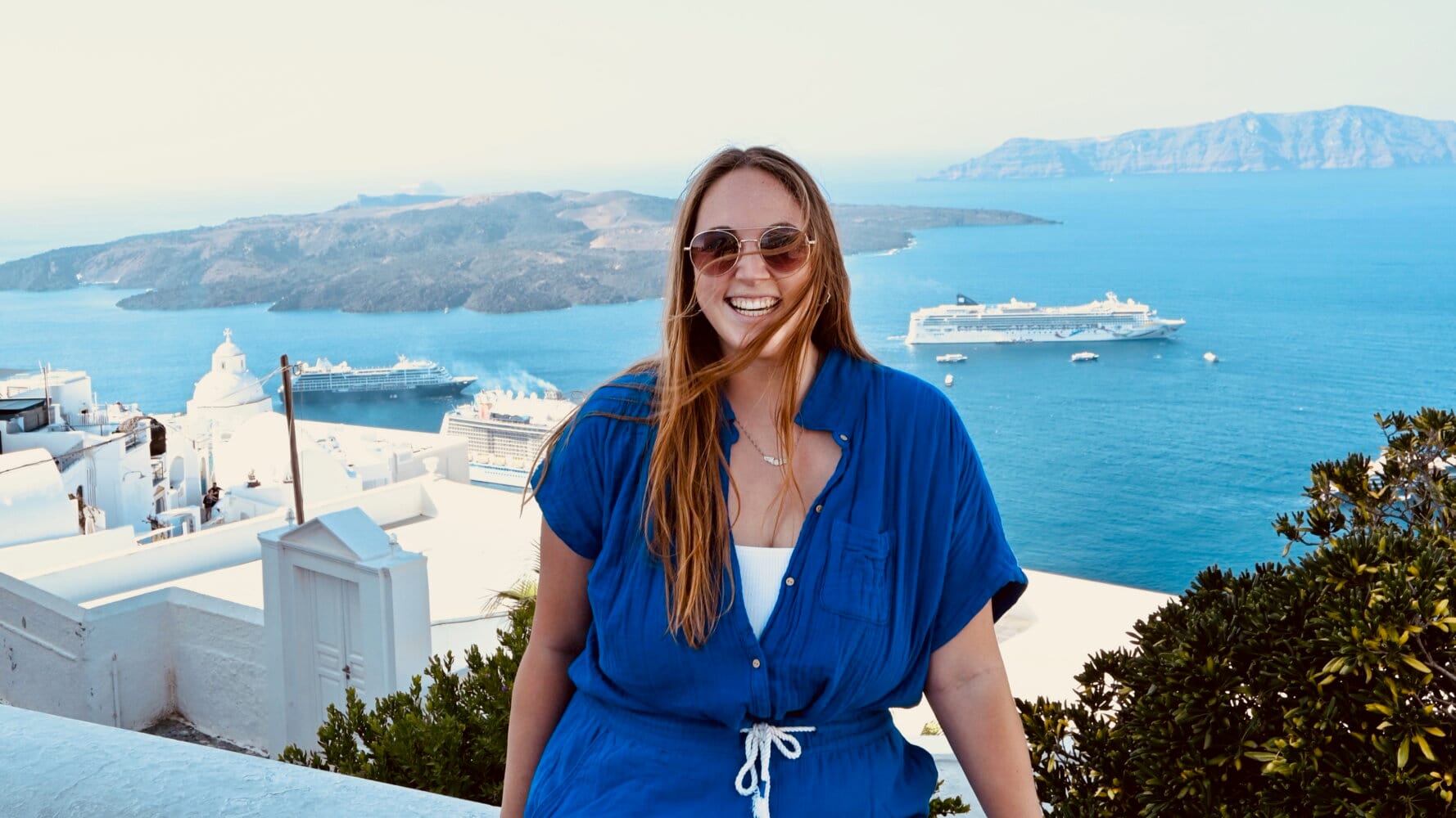 Cruise outfit ideas for October Mediterranean - Allie Hubers in Santorini