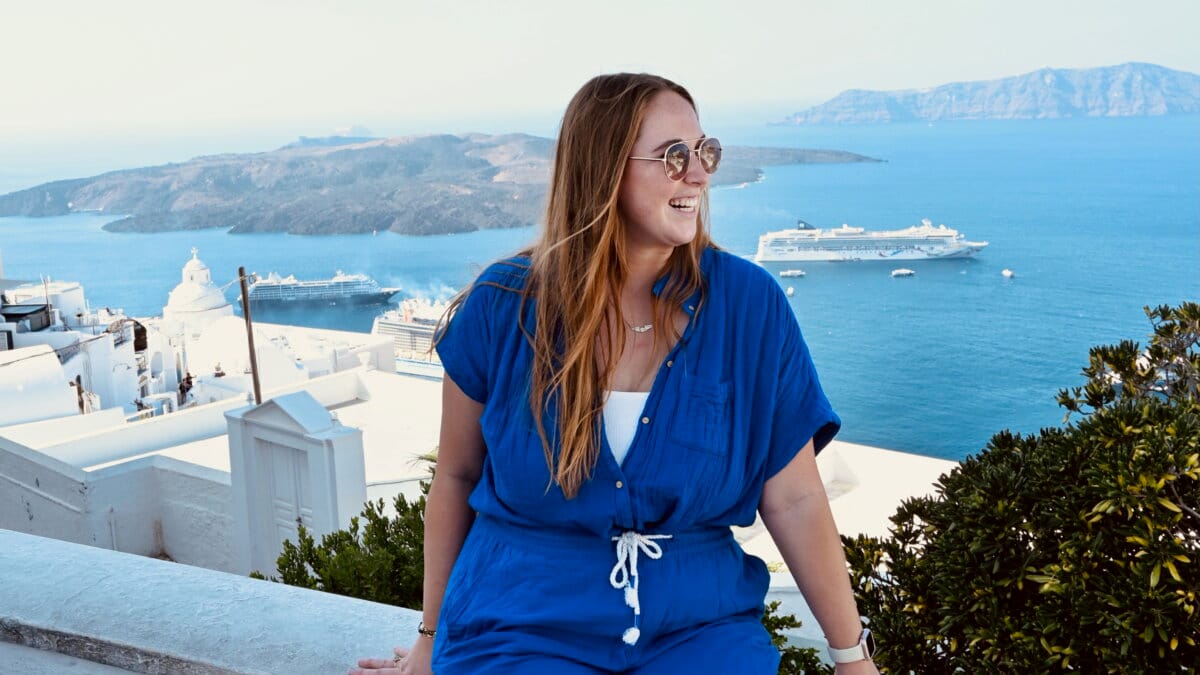 Cruise outfit ideas for October Mediterranean - Allie Hubers in Santorini