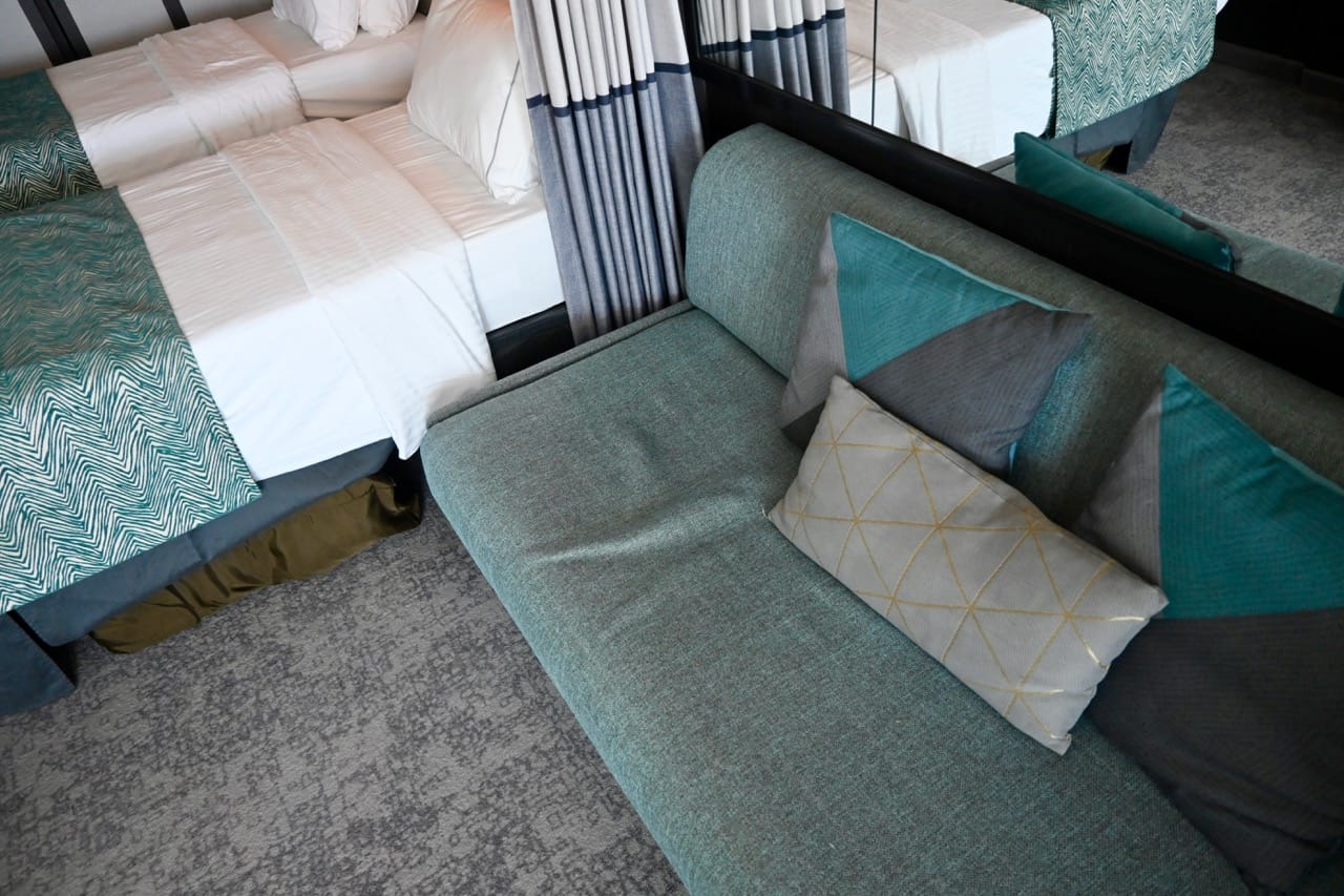 Norwegian Cruise Line Club Balcony Suite couch