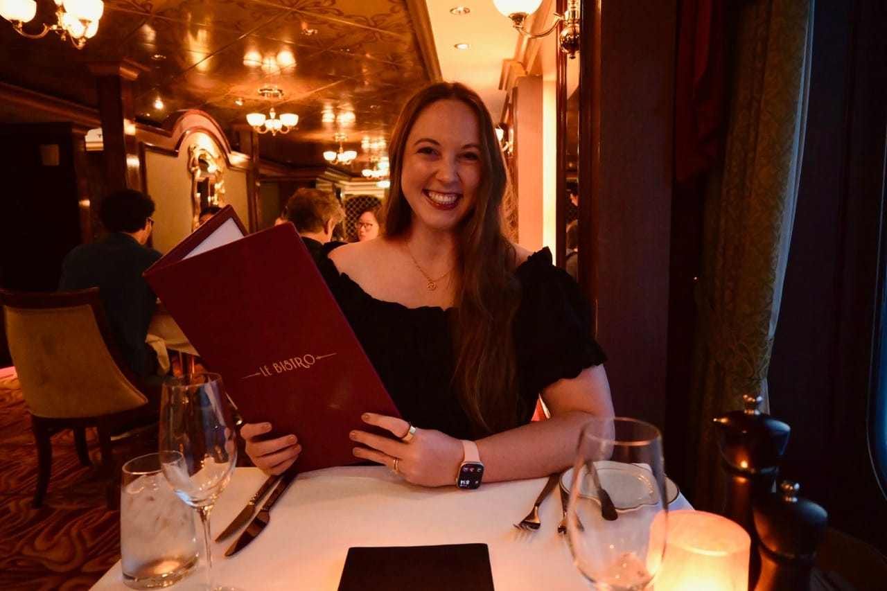 Allie Hubers dining at NCL Le Bistro Restaurant