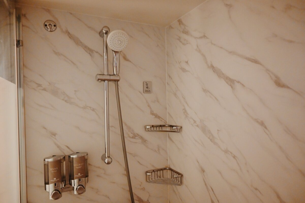 NCL Pearl Club Balcony Suite Bathroom