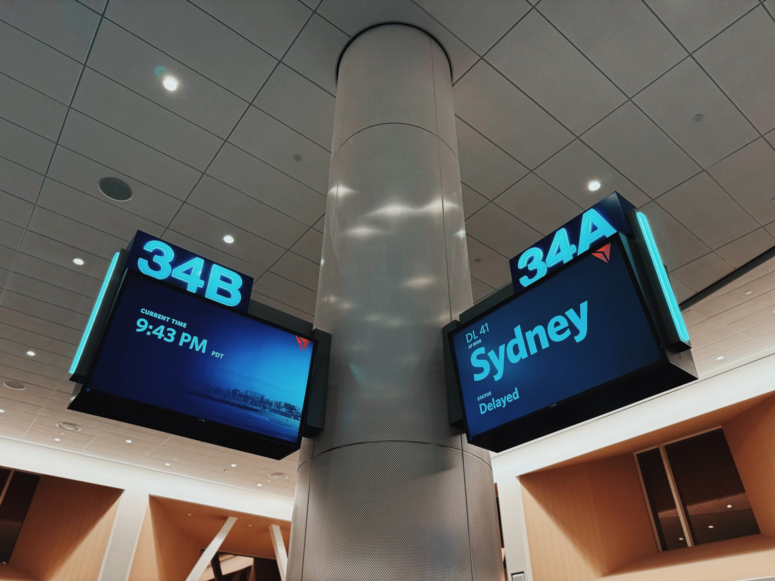 Sydney Flight Delay Sign at Gate