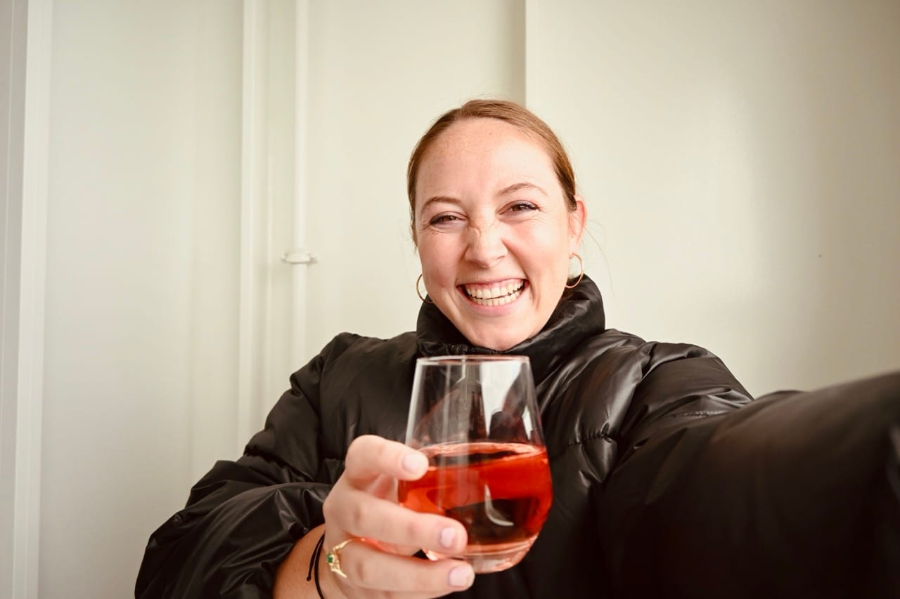 Allie Hubers with glass of wine on Celebrity Cruise