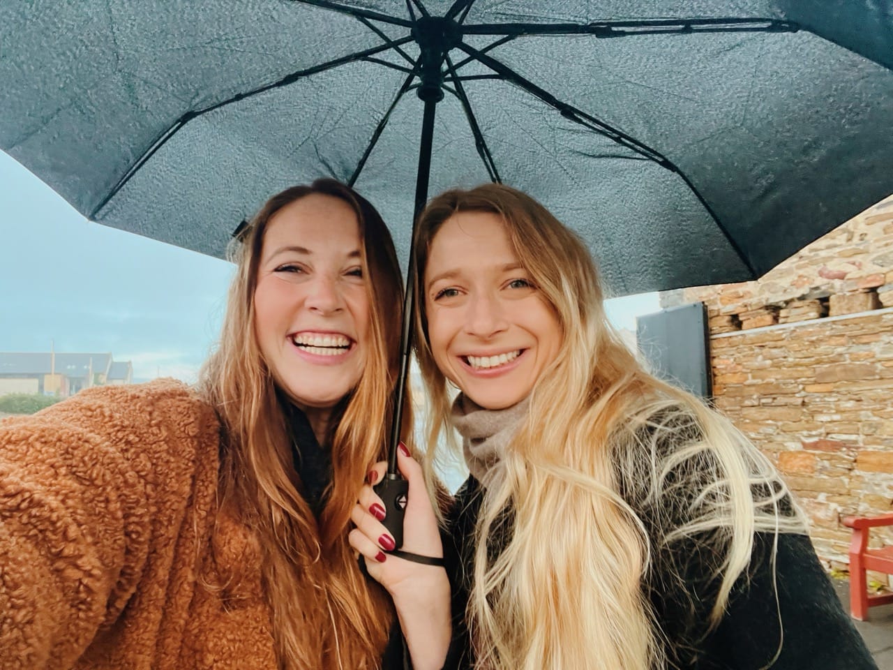 Allie Hubers and Hayley Phillips in Scotland wearing British Isles Cruise Outfits