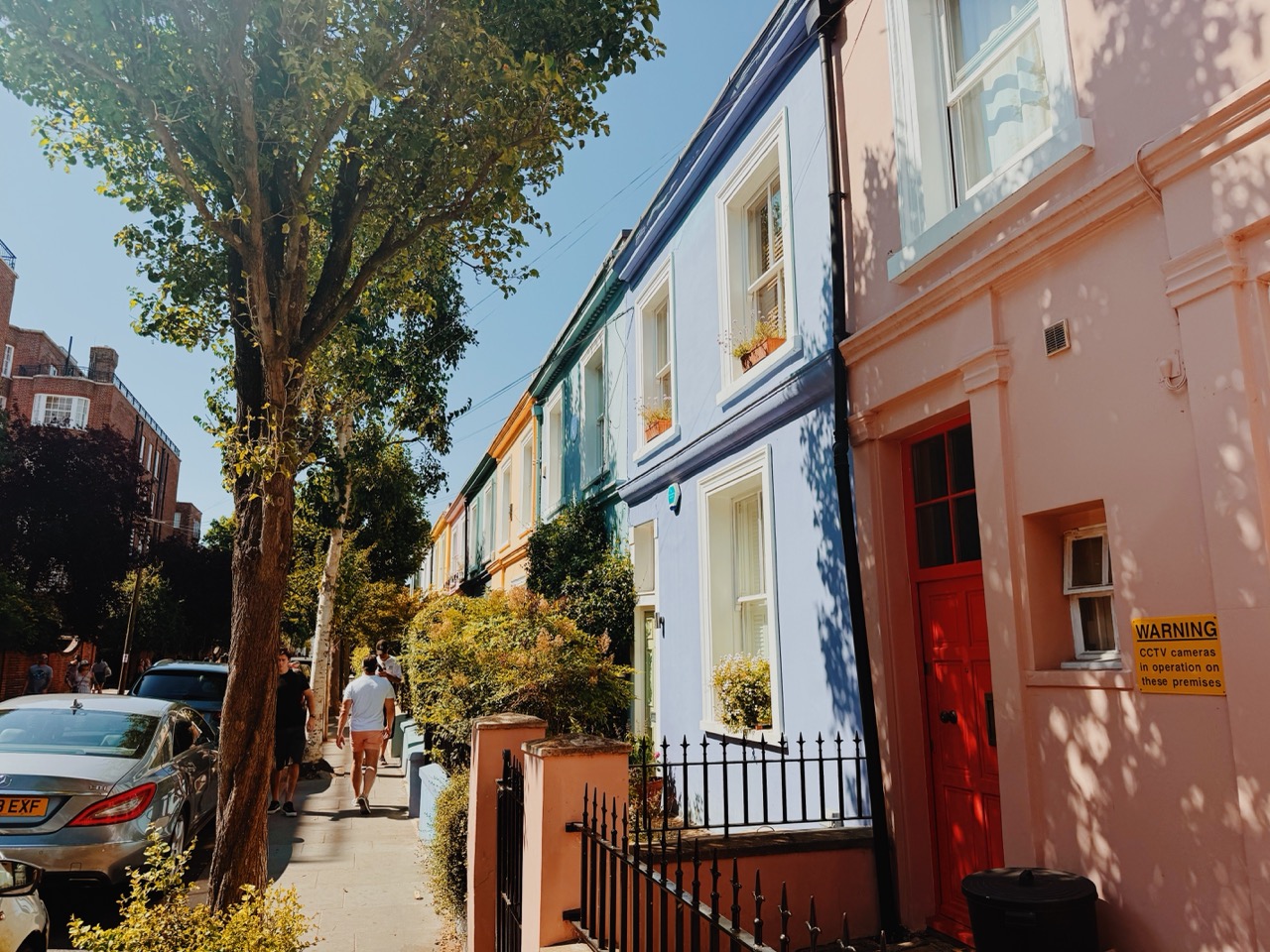 Notting Hill neighborhood colorful homes on Portobello Road